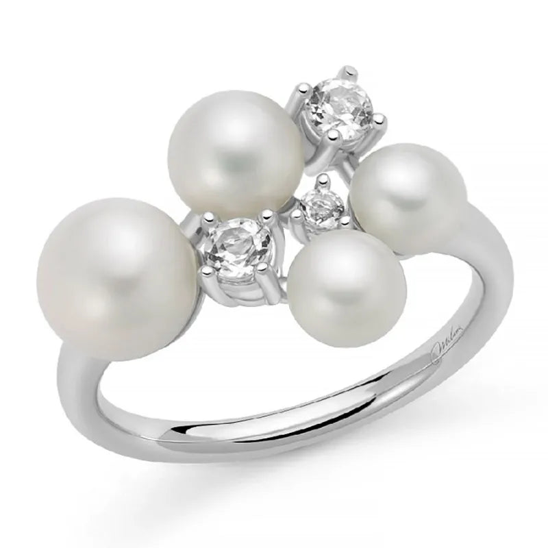 ANELLO ANDROMEDA CON QUATTRO PERLE ORIENTE E TOPAZI BIANCHI
